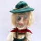 Sculpture: Otto Hacked doll with soft body and china hands and feet. Doll face is replaced with uncanny head made from textile.
