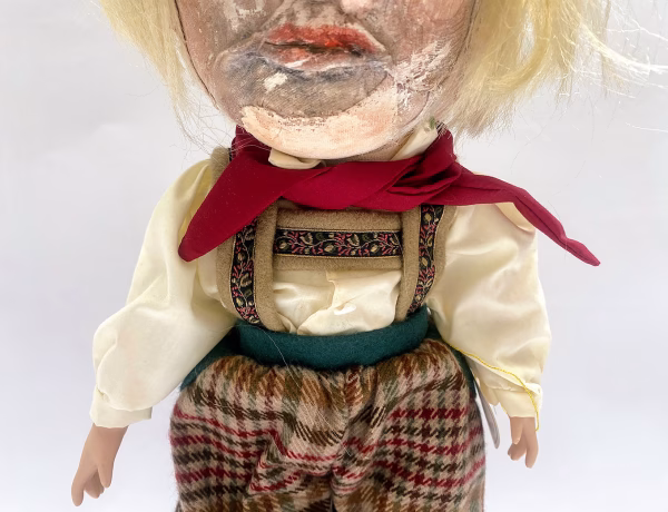 Sculpture: Otto chest Hacked doll with soft body and china hands and feet. Doll face is replaced with uncanny head made from textile.