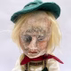 Sculpture: Otto head Hacked doll with soft body and china hands and feet. Doll face is replaced with uncanny head made from textile.