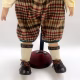 Sculpture: Otto legs, feet and stand Hacked doll with soft body and china hands and feet.