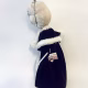 Hacked doll with a Kilner jar clip around its 'ugly' uncanny head.
