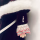 Doll detail: velvet dress with white fur trim and muff.