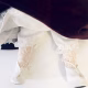 Doll detail: white lacy tights and long knickers.