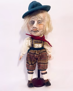 Sculpture: Otto frontal view Hacked doll with soft body and china hands and feet. Doll face is replaced with uncanny head made from textile.