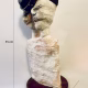 Double headed skeletal torso sculpture crowned with a vintage mechanical hubodometer
