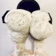 Double headed skeletal torso sculpture crowned with a vintage mechanical hubodometer