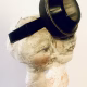 Double headed skeletal torso sculpture crowned with a vintage mechanical hubodometer