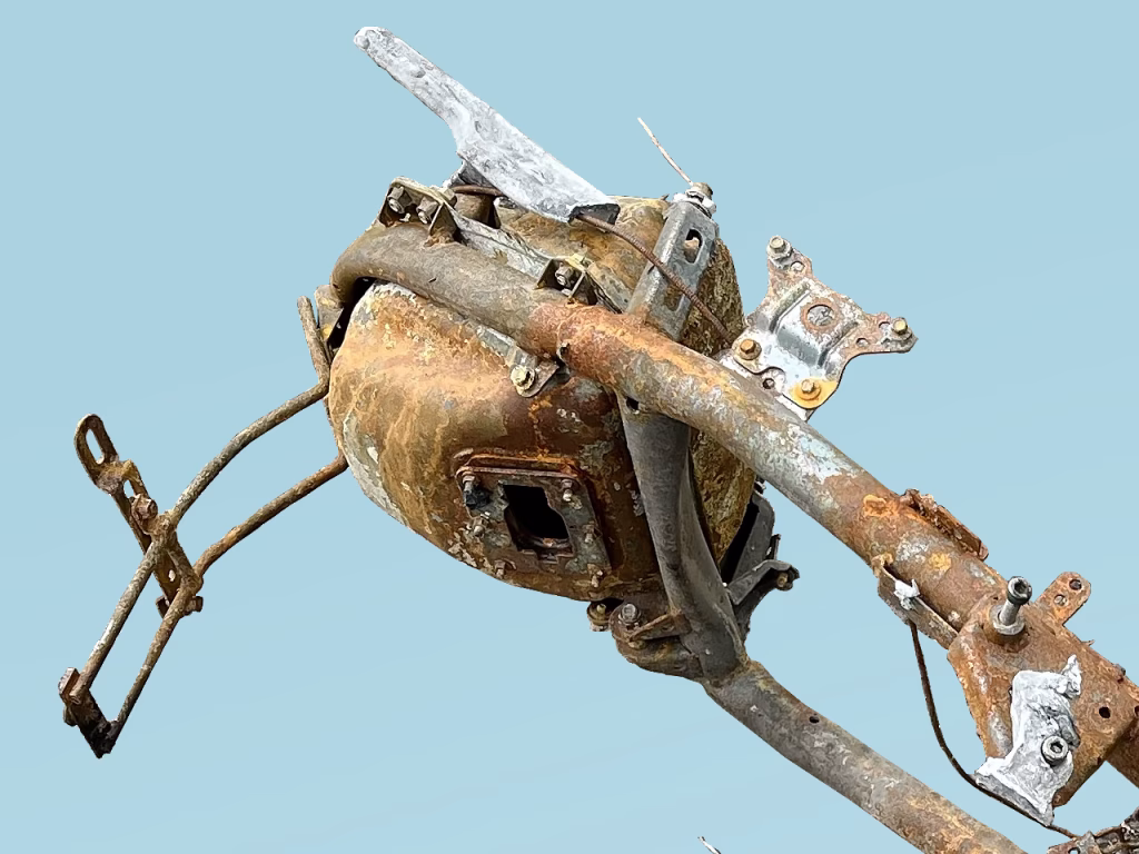 Partial image of a torched motorbike on blue background