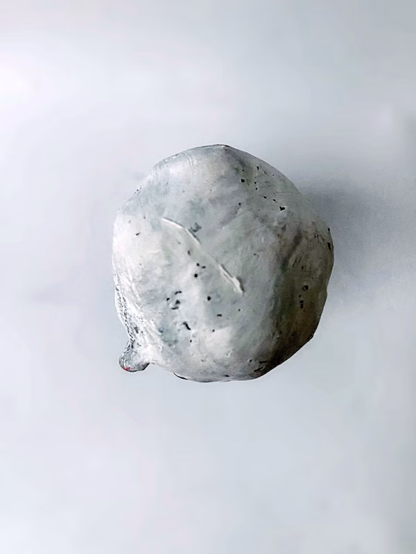 Small sculpture head / bird's eye view