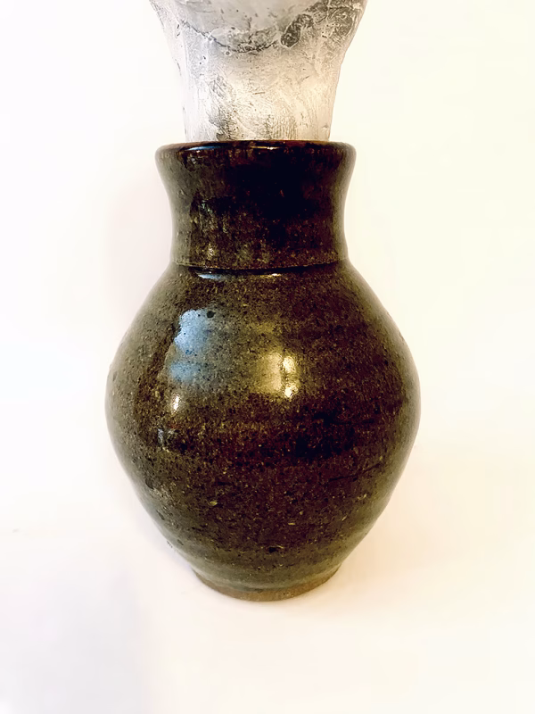 ceramic pot with bottom part of sculpture head