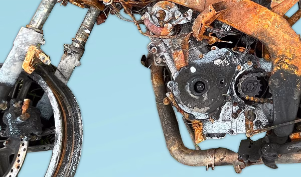 Machina Incensa I Details of a torched scooter