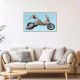 Machina Incensa II Photograph of a torched scooter in a frame in room interior